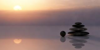 A lagom printed wallpaper example with balancing rocks at sunset